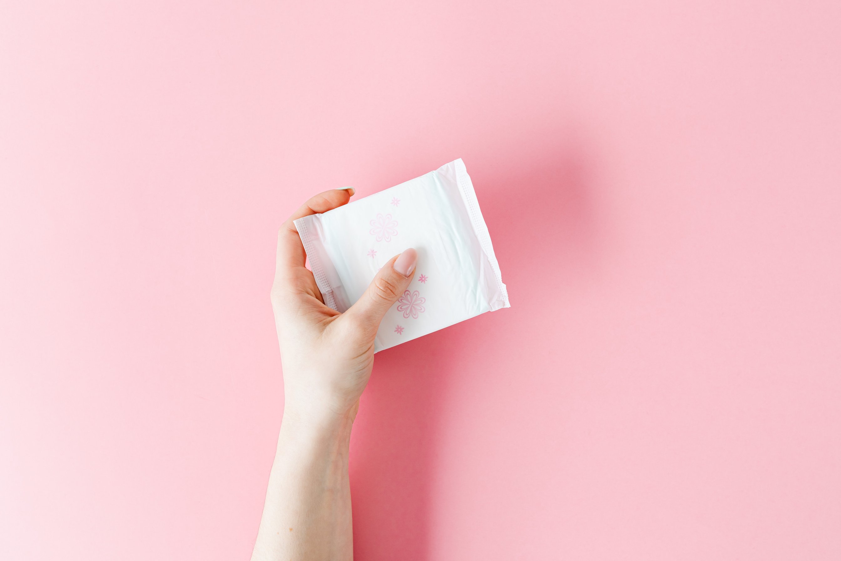 A Person Holding White Sanitary Napkin